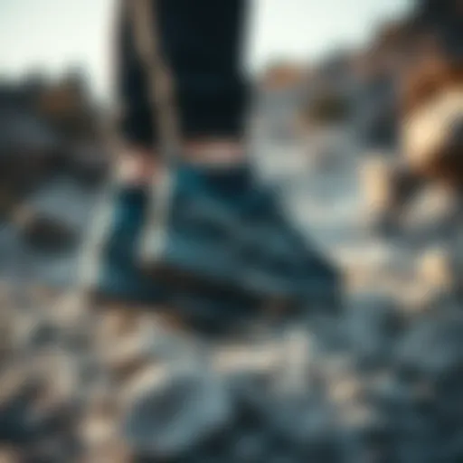 Lightweight Asics outdoor footwear on a rocky trail