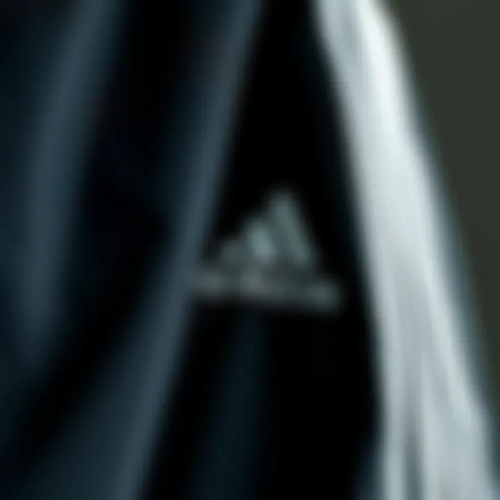 Close-up of Adidas tracksuit fabric, emphasizing durability