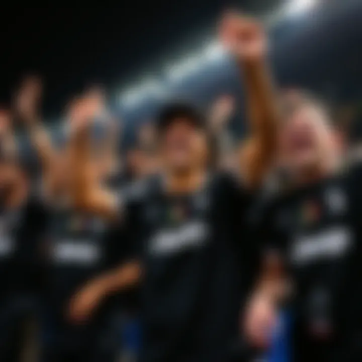 Juventus fans celebrating in black jerseys during a match