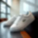 Lacoste white sneakers on a stylish background