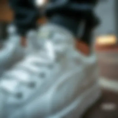 Close-up of Puma white sneaker showcasing design details