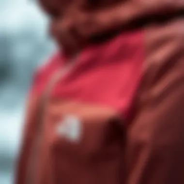 Close-up of TNF jacket's high-performance fabric highlighting its technical features.